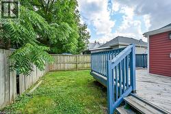 Fenced backyard with a deck - 