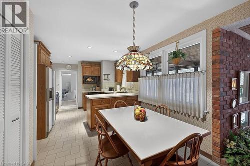 Dining area featuring wallpapered walls and recessed lighting - 9 Daleview Court, Hamilton, ON - Indoor Photo Showing Dining Room