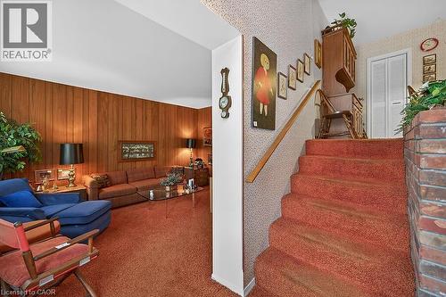 Stairway with carpet floors and wood walls - 9 Daleview Court, Hamilton, ON - Indoor