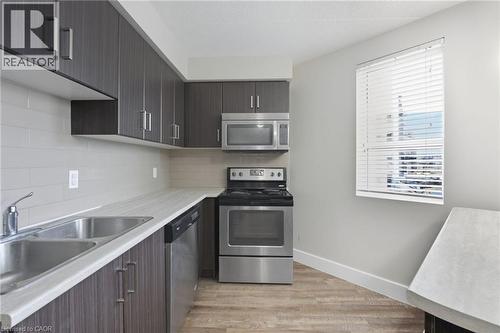 149 Main Street W Unit# 607, Hamilton, ON - Indoor Photo Showing Kitchen With Double Sink