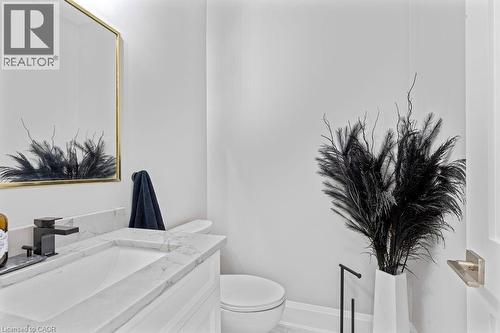 Half bathroom featuring toilet and vanity - 308 Appleby Line, Burlington, ON - Indoor Photo Showing Bathroom