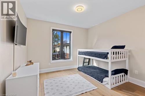 Bedroom with baseboards and light wood-type flooring - 308 Appleby Line, Burlington, ON - Indoor Photo Showing Bedroom