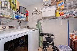 Washroom featuring washing machine and dryer - 