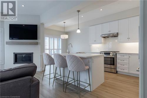 31 Southam Lane, Hamilton, ON - Indoor Photo Showing Kitchen With Fireplace With Upgraded Kitchen
