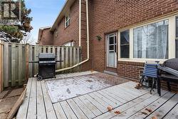 Wooden terrace featuring grilling area - 