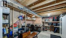 Unfinished basement with a desk - 