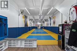 Garage featuring a wainscoted wall - 