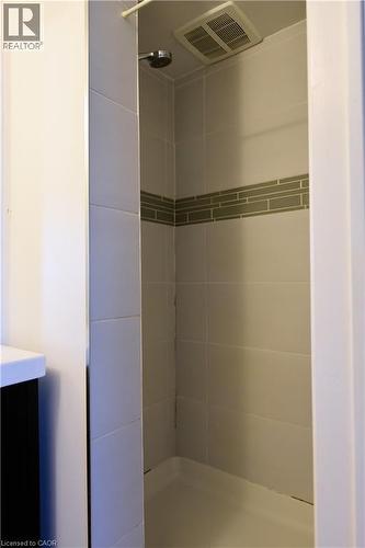 Full bathroom with vanity and a tile shower - 1448 Upper Ottawa Street, Hamilton, ON - Indoor Photo Showing Bathroom