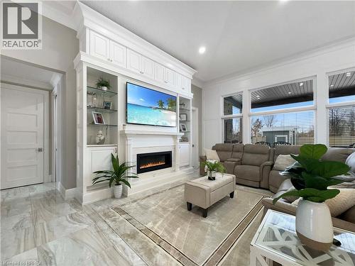 18 Harper Boulevard, Brantford, ON - Indoor Photo Showing Living Room With Fireplace