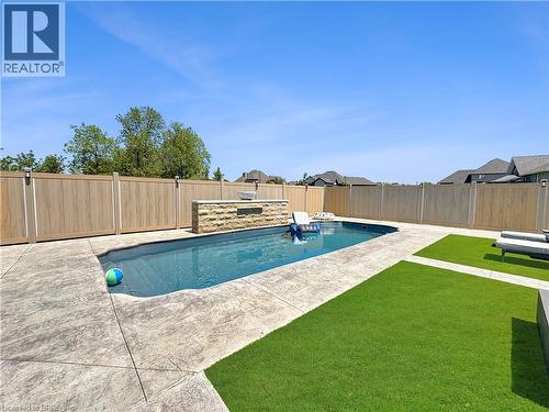 18 Harper Boulevard, Brantford, ON - Outdoor With In Ground Pool With Backyard