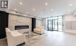Building lobby with expansive windows and recessed lighting - 