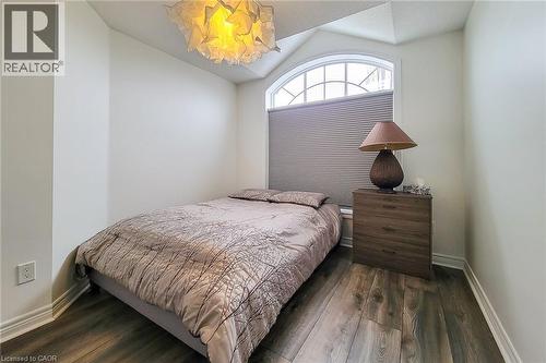 Bedroom with lofted ceiling and hardwood / wood-style flooring - 3362 Whilabout Terrace, Oakville, ON - Indoor Photo Showing Bedroom