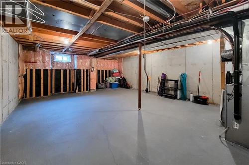 Below grade area with heating unit - 3362 Whilabout Terrace, Oakville, ON - Indoor Photo Showing Basement