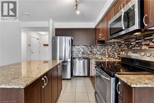 1940 Ironstone Drive Unit# 1006, Burlington, ON - Indoor Photo Showing Kitchen With Upgraded Kitchen