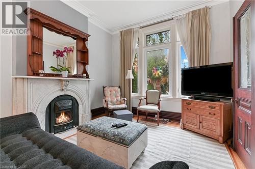 30 Ontario Avenue, Hamilton, ON - Indoor Photo Showing Living Room With Fireplace