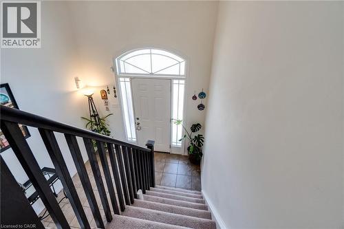 Foyer entrance with stairway and a high ceiling - 928 Dunblane Court, Kitchener, ON - Indoor Photo Showing Other Room