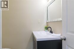 Half bathroom featuring vanity - 