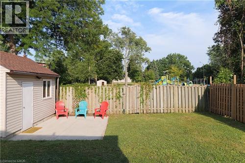 Fenced backyard featuring a patio area and a playground - 39 Cloverhill Road, Hamilton, ON - Outdoor