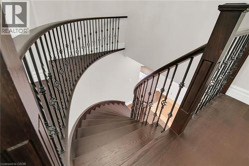 Stairway with wood finished floors and baseboards - 125 Valera Drive, Hamilton, ON 