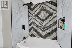 Bathroom featuring bathtub / shower combination - 