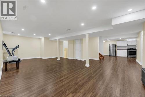 Workout area featuring recessed lighting and dark wood finished floors - 125 Valera Drive, Hamilton, ON 