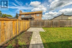 View of fenced backyard - 
