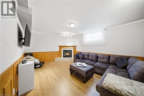 47 Burnt Ember Court, Kitchener, ON - Indoor Photo Showing Living Room With Fireplace