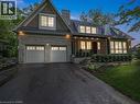 View of front of home with a standing seam roof, a metal roof, and covered porch - 1322 Minaki Road, Mississauga, ON  - Outdoor With Facade 