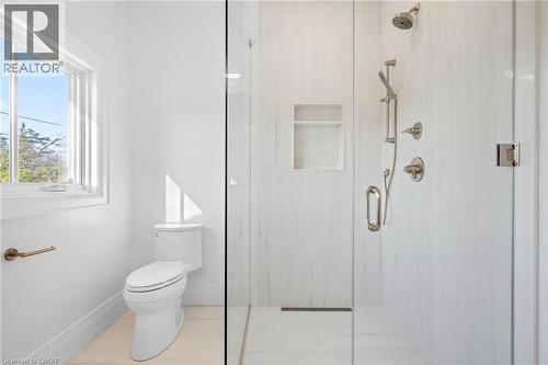 Bathroom with a shower stall and tile patterned floors - 1322 Minaki Road, Mississauga, ON - Indoor Photo Showing Bathroom