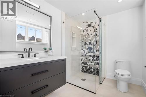 Full bath featuring vanity, a stall shower, recessed lighting, and light tile patterned flooring - 1322 Minaki Road, Mississauga, ON - Indoor Photo Showing Bathroom