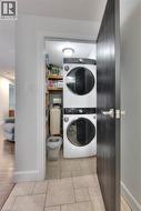 Laundry Room featuring Washing machine and dryer - 