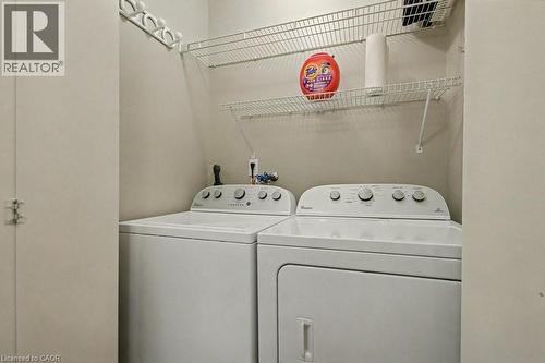 Laundry area featuring washer and dryer - 165 Main Street E Unit# 9, Grimsby, ON - Indoor Photo Showing Laundry Room