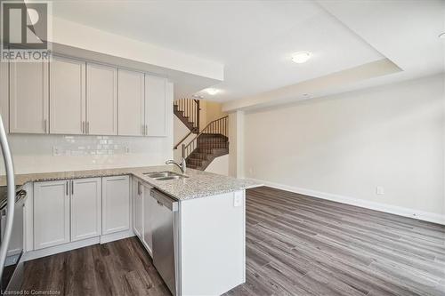 1593 Rose Way Unit# 105, Milton, ON - Indoor Photo Showing Kitchen With Double Sink