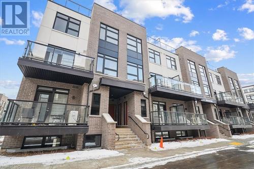1593 Rose Way Unit# 105, Milton, ON - Outdoor With Balcony With Facade