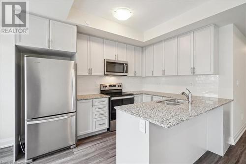 1593 Rose Way Unit# 105, Milton, ON - Indoor Photo Showing Kitchen With Double Sink With Upgraded Kitchen