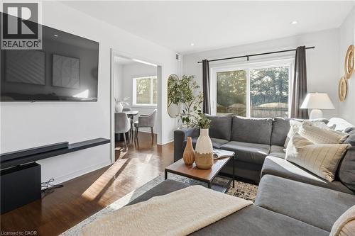 Living room with wood finished floors and recessed lighting - 2069 Meadowbrook Road Unit# 4, Burlington, ON - Indoor Photo Showing Living Room