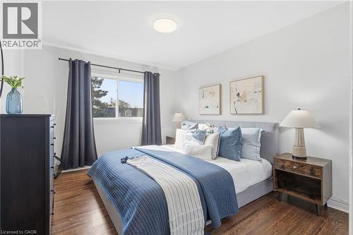 Bedroom featuring dark wood-type flooring - 2069 Meadowbrook Road Unit# 4, Burlington, ON - Indoor Photo Showing Bedroom