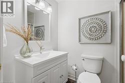 Bathroom with vanity and toilet - 