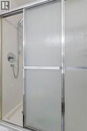 Full bath featuring a stall shower - 