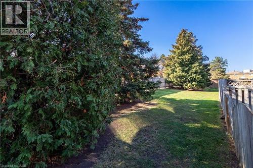 View of fenced backyard - 2069 Meadowbrook Road Unit# 4, Burlington, ON - Outdoor