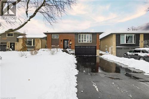 View of front of home featuring brick siding and a garage - 364 Roselawn Place, Waterloo, ON - Outdoor