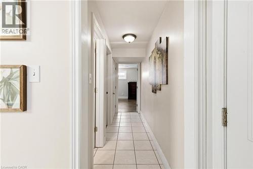 Hallway with light tile patterned flooring and baseboards - 364 Roselawn Place, Waterloo, ON - Indoor Photo Showing Other Room
