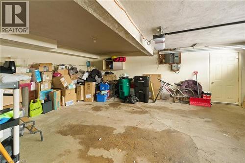 Garage featuring a garage door opener - 364 Roselawn Place, Waterloo, ON - Indoor Photo Showing Garage