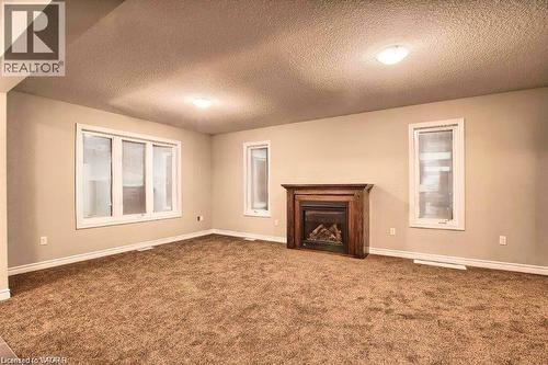 1360 Caen Avenue, Woodstock, ON - Indoor With Fireplace