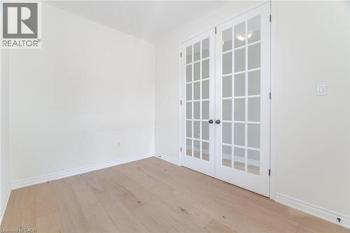 Unfurnished room with light wood-style floors and baseboards - 28 Pickett Place, Cambridge, ON - Indoor Photo Showing Other Room