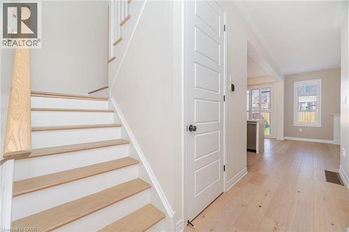 Staircase with hardwood / wood-style flooring and baseboards - 28 Pickett Place, Cambridge, ON - Indoor Photo Showing Other Room