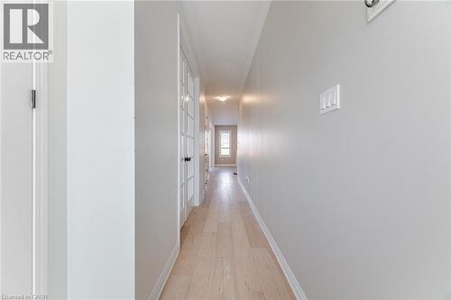 Hallway with light wood-style floors and baseboards - 28 Pickett Place, Cambridge, ON - Indoor Photo Showing Other Room