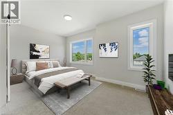 Bedroom with light colored carpet and a barn door - 