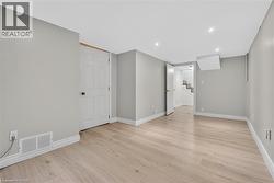 Unfurnished recreation or living room lower level - 