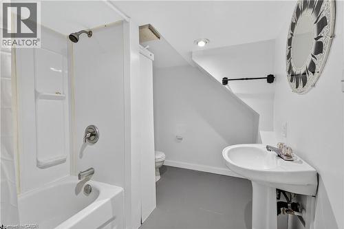 Full bathroom featuring shower / bath combo and toilet - 111 Hillyard Street, Hamilton, ON - Indoor Photo Showing Bathroom
